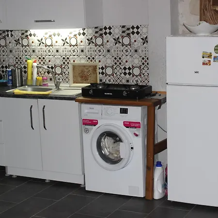 Mutlu Koey'de Sakinligin Adresi Сasa de vacaciones Ayvalı